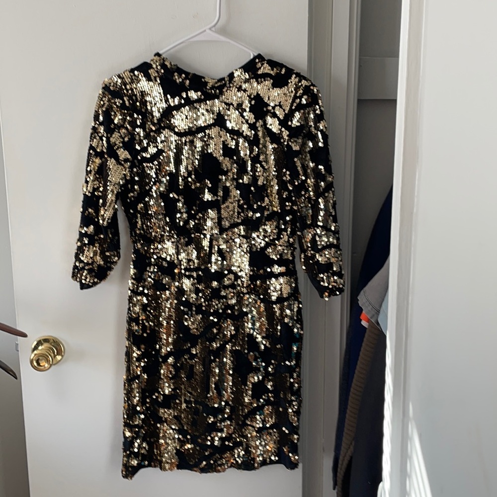 Beautiful New year classy cocktail dress. Open back.